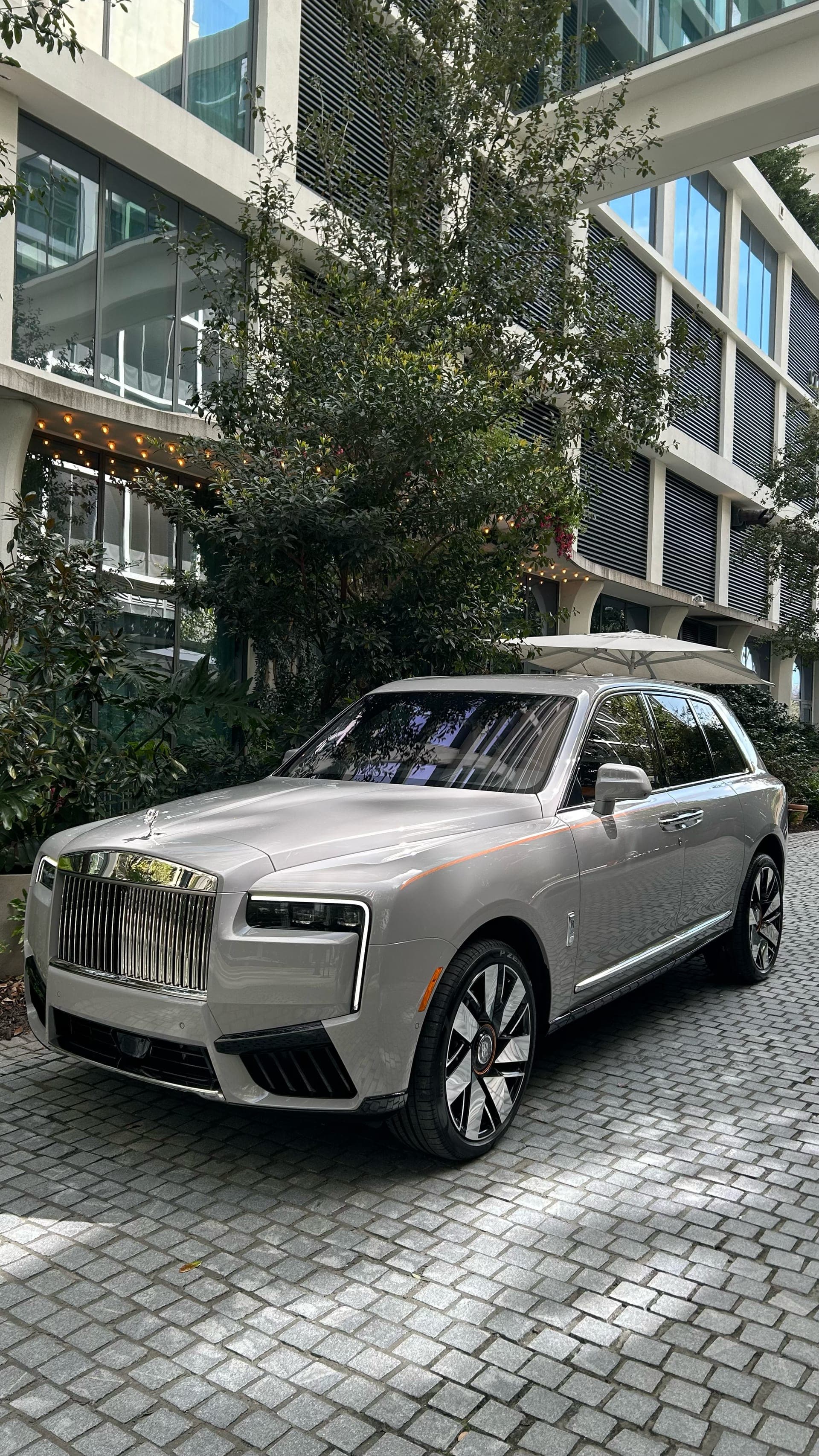 Rolls-Royce Cullinan after a luxury detail on a Tampa courtyard